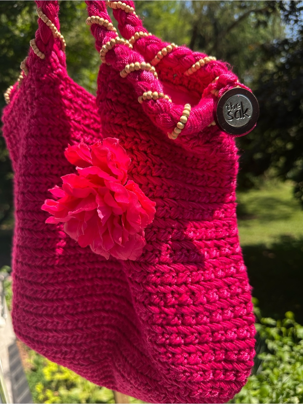 The Sak Fuchsia Crochet Shoulder Bag with Floral Accent - Picture 2 of 10